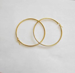 BRAND NEW PAIR OF GOLD FILLED HOOP EARRINGS. MEASURES 2 1/2 X 2 1/2''