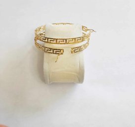 BRAND NEW PAIR OF GOLD FILLED HOOP EARRINGS. MEASURES 2 1/2 X 2 1/2''