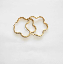 BRAND NEW PAIR OF GOLD FILLED HOOP EARRINGS. MEASURES 2 1/2 X 2 1/2''