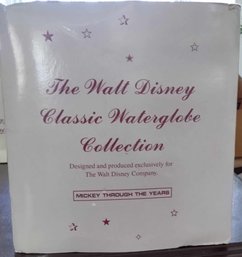 THE WALT DISNEY CLASSIC WATERGLOBE COLLECTION-MICKEY THROUGH THE YEARS WIND-UP MUSICAL WATERGLOBE