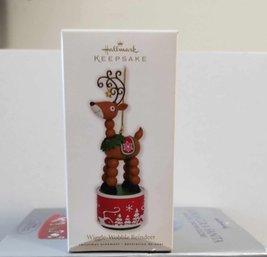 LIKE NEW 2010 HALLMARK KEEPSAKE WIGGLE WOBBLE REINDEER HAND CRAFTED CHRISTMAS TREE ORNAMENT