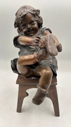 Early 20th Century Spanish Bronze Entitled 'Girl Putting On Her Shoe' By Juan Clara