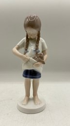 B&G (Bing & Grndahl) Figurine  Girl Holding A Cat  7' .  Shippable