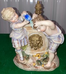 Porcelain Girl Washing Boys Hair