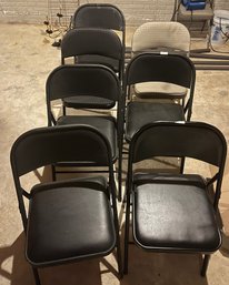 Seven Metal Folding Chairs