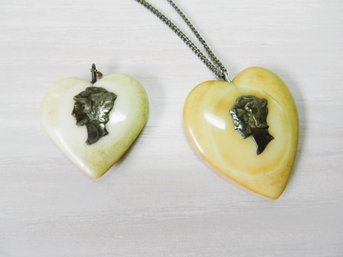 (A22)   Vintage Bakelite/Lucite Heart Pendants With Silver Mercury Profiles