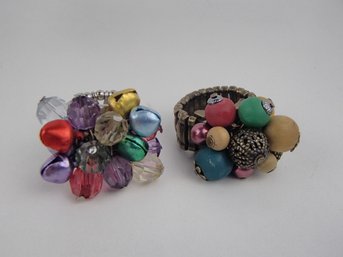 Two Festive Stretch Rings See Photo's For Size And Condition