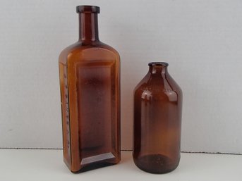 S.F. Baker And Co. Amber Iowa Bottle And Amber Beer Bottle