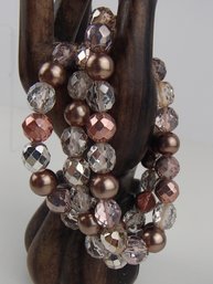 Three Strand Glass And Plastic Bead Stretch Bracelet