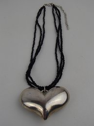 17' Multi Strand Black Glass Seed Beed With Large Silver Tone Heart Pendant