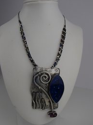 Three Strand Necklace With Artisan Metal Pendant