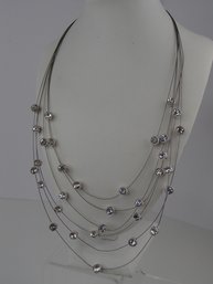 Multistrand Wire Necklace With Floating Rhinestones