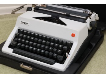 Olympia Portable Manual Typewriter With Hardshell Carrying Case