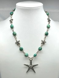 Lot 982LC - Sail Away In This Nautical Inspired Starfish Necklace Adorned With Green Chalcedony Stones