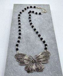 Lot 988LC - 1970s Silvertone Filigree Large Butterfly Pendant Statement Necklace With Black Round Beads