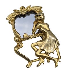 Lot 989LC - 1980s Goldtone Art Deco Style Lady Looking In Mirror Statement Brooch