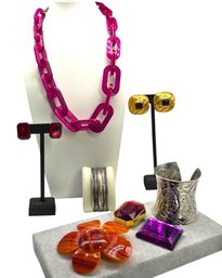 Lot 911WA - Bold Statement Jewelry 2 Cuff Bracelets, Plastic Flower Pin, Purple Link Necklace, 2 Gem Brooches
