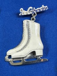Lot 354LC - 1950-60s Ice Capades White Skate Souvenir Celluloid Plastic Pin