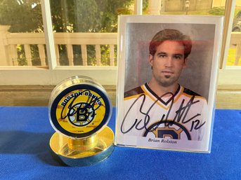 Lot 485 - Bruins Collection Brian Rolston #12 Autograph - Photo- Hockey Puck & Newspaper Clipping Signing