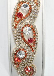 Lot 963LC - Beautiful For Prom! Wavy Orange & Clear Rhinestone Bracelet - Costume Gold