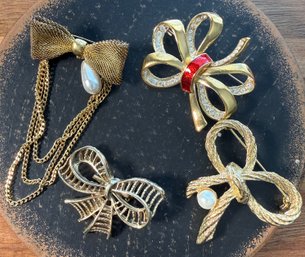 Lot 497LC - 4 Goldtone Bow Brooches, Signed AAI, Roman And Made In Taiwan Red Enamel, Faux Pearls, Rhinestones