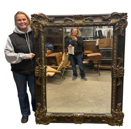 Lot 320 - French Regency - Very Large Beveled Ornate Baroque Mirror - Ebony & Gold Finish Carved Gilt Accents