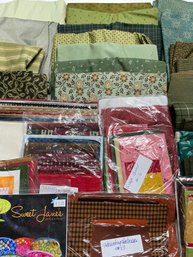 Lot 149Q - Green Shades & Various Patterns Lots Of Fat Quarters And Several Different Sizes Of Yardage