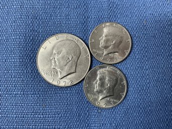 Lot 656WH - Lot Of 2 Kennedy Half Dollars From 1972 And 1973 And A Eisenhower Dollar From 1972.