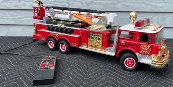 Lot 205- Remote Control RC NEW BRIGHT Toy Fire Ladder Truck Over 2 Feet Long! Needs Batteries