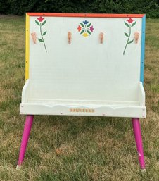 Lot 406 - 1980s Childs Hand Crafted Table Top Standing Easel  With Flowers Prime Colors And Slots For Paints