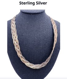 Lot 40DD - Sterling Silver Italy Braided Necklace Measuring 20.25 Inches