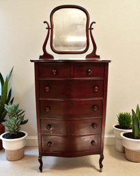 Lot 254CV - Nice! Mahogany 6 Drawer High Boy Curvy Dresser Chest Bureau & Beveled Mirror - On Caster Wheels