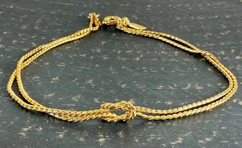 Lot 429LC - Love Knot Bracelet By Accent By Hallmark Very Delicate Goldtone