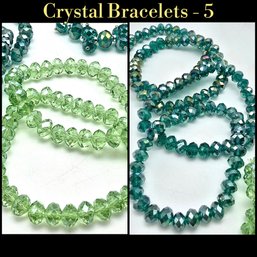 Lot 900A - Seven Green & Light Green Crystal Bracelets
