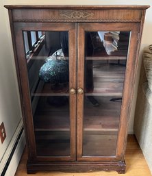 Glass-Front Display Cabinet With Decorative Carved Accents