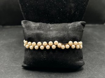 Woven Pearl Gold Tone Chain Bracelet