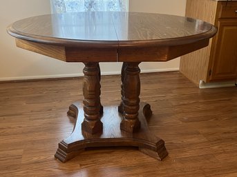 Vintage Solid Oak Round-to-Oval Split Pedestal Dining Table - Honey Finish