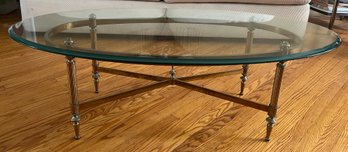 Vintage Hollywood Regency Brass Oval Coffee Table With Elegant Reeded Legs And Glass Top.