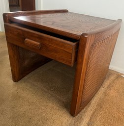 Vintage Oak Accent Table With Single Drawer And Cane Side Panels