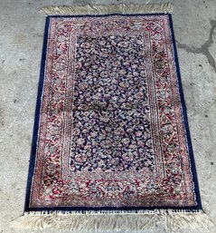 Vintage Hand-Knotted Traditional Oriental Area Rug Featuring A Navy Blue, Red, & Ivory Floral Design