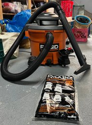 Rigid Wet/dry Vacuum Model: WD12701 Serial: 18202R010083 & Bag - 2 Pieces