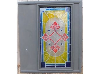 Stained Glass Framed In Wooden Panel