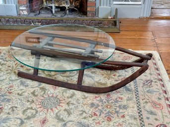 Sled With Glass Top Table