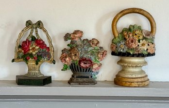 Three Vintage Iron Doorstops