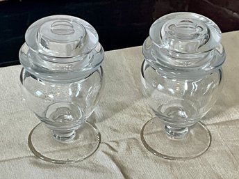 Two Small Glass Covered Urns