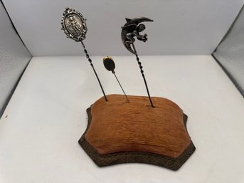 Antique Hatpins On A Cushion