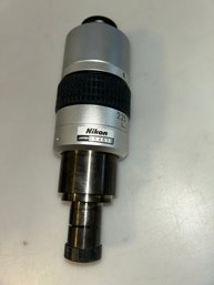 Nikon Camera Adapter For A Microscope.