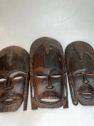 Vintage Hand-carved Dark Wood Tribal Face Masks