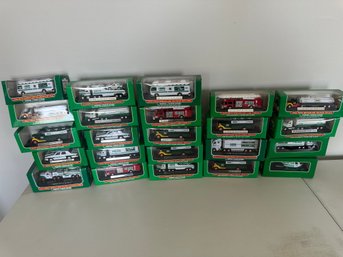 NIB Lot Of 23 Miniature Hess Trucks
