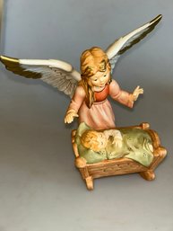 Goebel Porcelain Figurine Titled 'Guardian Angel With Cradle'